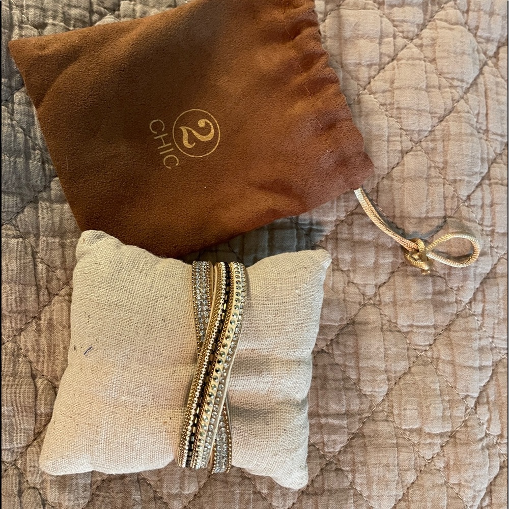 Gorgeous wrap bracelet in natural tones with sparkle in clear, white, & bronze.